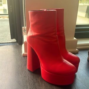 Platform red chunky heels.